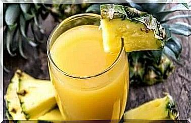 Mixed drink with papaya, orange and pineapple 