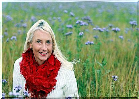 during menopause - woman in the flower field